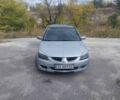 Сірий Міцубісі Lancer, об'ємом двигуна 1.6 л та пробігом 244 тис. км за 3300 $, фото 1 на Automoto.ua