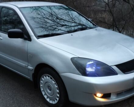 Серый Мицубиси Лансер, объемом двигателя 1.6 л и пробегом 235 тыс. км за 2850 $, фото 3 на Automoto.ua