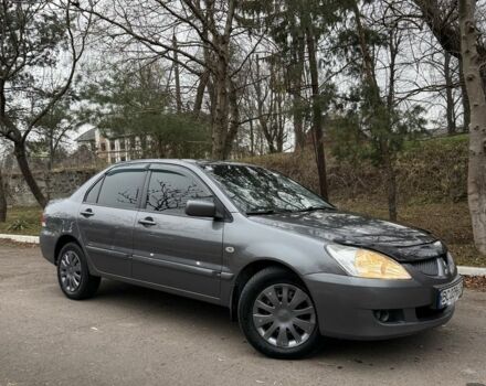 Сірий Міцубісі Lancer, об'ємом двигуна 1.6 л та пробігом 230 тис. км за 2799 $, фото 7 на Automoto.ua