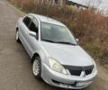 Міцубісі Lancer 2005 у Чернівцях на Automoto.ua Сірий Міцубісі Lancer, об'ємом двигуна 1.6 л та пробігом 319 тис. км за 2450 $, фото 2 на Automoto.ua
