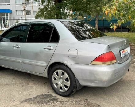 Мицубиси Лансер 2005 в Киеве на Automoto.ua Серый Мицубиси Лансер, объемом двигателя 1.58 л и пробегом 180 тыс. км за 2490 $, фото 7 на Automoto.ua