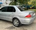 Мицубиси Лансер 2005 в Киеве на Automoto.ua Серый Мицубиси Лансер, объемом двигателя 1.58 л и пробегом 180 тыс. км за 2490 $, фото 7 на Automoto.ua