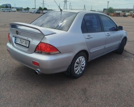 Серый Мицубиси Лансер, объемом двигателя 1.6 л и пробегом 250 тыс. км за 3600 $, фото 5 на Automoto.ua