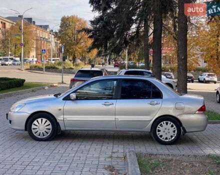 Серый Мицубиси Лансер, объемом двигателя 1.58 л и пробегом 250 тыс. км за 3750 $, фото 7 на Automoto.ua