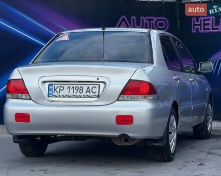 Сірий Міцубісі Lancer, об'ємом двигуна 1.58 л та пробігом 188 тис. км за 3799 $, фото 6 на Automoto.ua