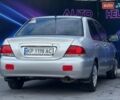 Сірий Міцубісі Lancer, об'ємом двигуна 1.58 л та пробігом 188 тис. км за 3799 $, фото 6 на Automoto.ua