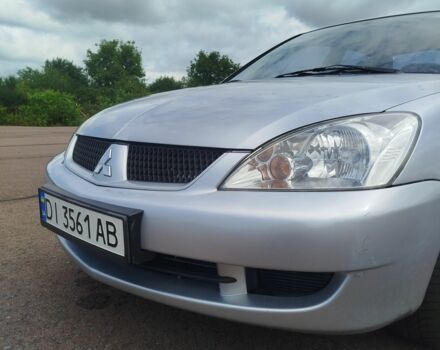 Серый Мицубиси Лансер, объемом двигателя 1.6 л и пробегом 250 тыс. км за 3600 $, фото 12 на Automoto.ua