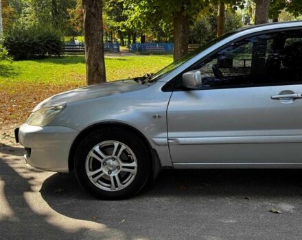 Серый Мицубиси Лансер, объемом двигателя 1.6 л и пробегом 196 тыс. км за 4390 $, фото 10 на Automoto.ua