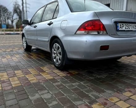 Сірий Міцубісі Lancer, об'ємом двигуна 1.6 л та пробігом 236 тис. км за 3800 $, фото 3 на Automoto.ua
