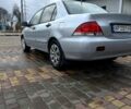 Сірий Міцубісі Lancer, об'ємом двигуна 1.6 л та пробігом 236 тис. км за 3800 $, фото 3 на Automoto.ua