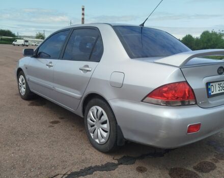 Серый Мицубиси Лансер, объемом двигателя 1.6 л и пробегом 250 тыс. км за 3600 $, фото 19 на Automoto.ua