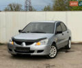Сірий Міцубісі Lancer, об'ємом двигуна 1.6 л та пробігом 310 тис. км за 3350 $, фото 2 на Automoto.ua