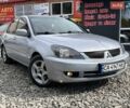 Сірий Міцубісі Lancer, об'ємом двигуна 1.6 л та пробігом 193 тис. км за 4400 $, фото 1 на Automoto.ua