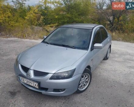 Сірий Міцубісі Lancer, об'ємом двигуна 1.6 л та пробігом 244 тис. км за 3300 $, фото 12 на Automoto.ua