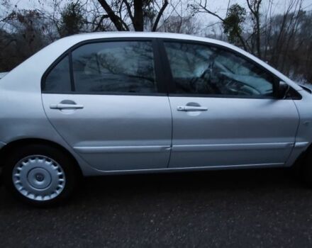 Серый Мицубиси Лансер, объемом двигателя 1.6 л и пробегом 235 тыс. км за 2850 $, фото 15 на Automoto.ua