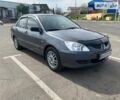 Сірий Міцубісі Lancer, об'ємом двигуна 1.58 л та пробігом 200 тис. км за 4999 $, фото 6 на Automoto.ua