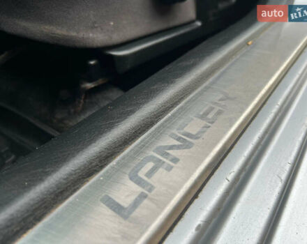 Сірий Міцубісі Lancer, об'ємом двигуна 1.6 л та пробігом 310 тис. км за 3350 $, фото 30 на Automoto.ua