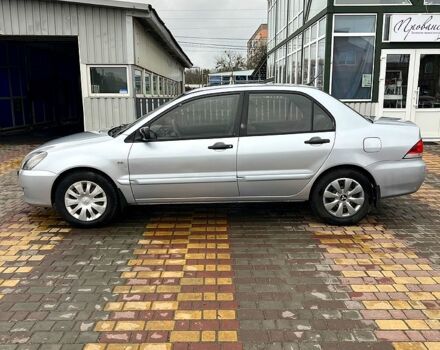 Сірий Міцубісі Lancer, об'ємом двигуна 1.6 л та пробігом 236 тис. км за 3800 $, фото 4 на Automoto.ua