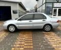 Сірий Міцубісі Lancer, об'ємом двигуна 1.6 л та пробігом 236 тис. км за 3800 $, фото 4 на Automoto.ua