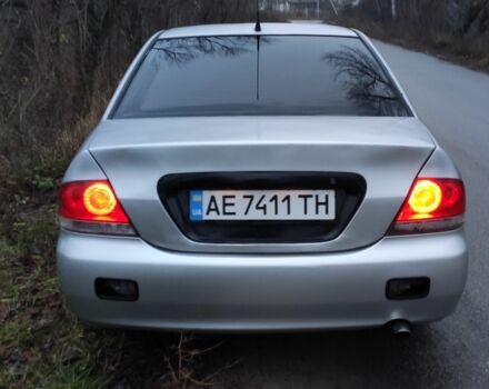 Серый Мицубиси Лансер, объемом двигателя 1.6 л и пробегом 235 тыс. км за 2850 $, фото 5 на Automoto.ua