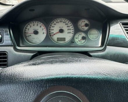 Серый Мицубиси Лансер, объемом двигателя 1.58 л и пробегом 260 тыс. км за 3500 $, фото 15 на Automoto.ua