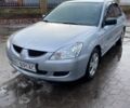 Сірий Міцубісі Lancer, об'ємом двигуна 0 л та пробігом 216 тис. км за 4150 $, фото 1 на Automoto.ua