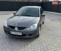 Сірий Міцубісі Lancer, об'ємом двигуна 1.58 л та пробігом 220 тис. км за 4500 $, фото 1 на Automoto.ua