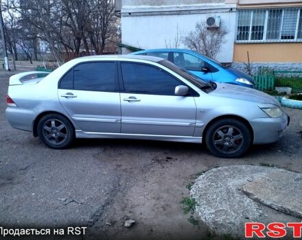 Сірий Міцубісі Lancer, об'ємом двигуна 1.6 л та пробігом 319 тис. км за 4250 $, фото 2 на Automoto.ua