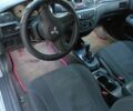 Сірий Міцубісі Lancer, об'ємом двигуна 1.6 л та пробігом 243 тис. км за 3551 $, фото 6 на Automoto.ua