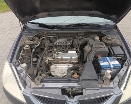 Серый Мицубиси Лансер, объемом двигателя 1.6 л и пробегом 242 тыс. км за 4600 $, фото 5 на Automoto.ua