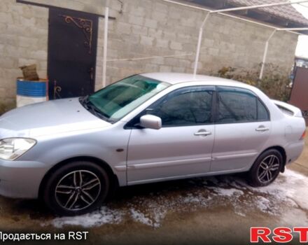 Сірий Міцубісі Lancer, об'ємом двигуна 1.6 л та пробігом 270 тис. км за 3900 $, фото 2 на Automoto.ua