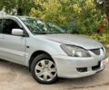 Мицубиси Лансер 2005 в Киеве на Automoto.ua Серый Мицубиси Лансер, объемом двигателя 1.58 л и пробегом 180 тыс. км за 2490 $, фото 3 на Automoto.ua