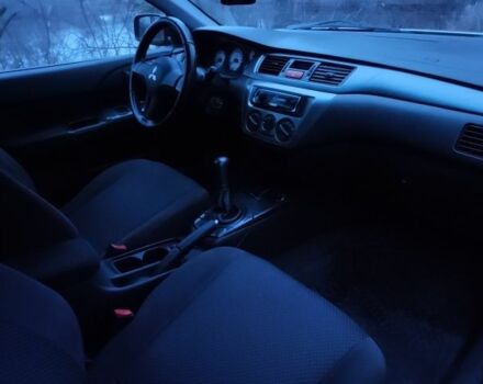 Серый Мицубиси Лансер, объемом двигателя 1.6 л и пробегом 235 тыс. км за 2850 $, фото 14 на Automoto.ua