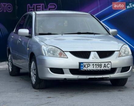 Сірий Міцубісі Lancer, об'ємом двигуна 1.58 л та пробігом 188 тис. км за 3799 $, фото 3 на Automoto.ua