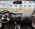 Серый Мицубиси Лансер, объемом двигателя 2 л и пробегом 249 тыс. км за 3800 $, фото 21 на Automoto.ua