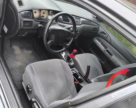 Сірий Міцубісі Lancer, об'ємом двигуна 1.6 л та пробігом 257 тис. км за 3700 $, фото 6 на Automoto.ua