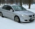 Сірий Міцубісі Lancer, об'ємом двигуна 1.6 л та пробігом 256 тис. км за 3800 $, фото 1 на Automoto.ua