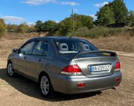 Сірий Міцубісі Lancer, об'ємом двигуна 1.6 л та пробігом 264 тис. км за 5000 $, фото 1 на Automoto.ua