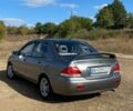 Сірий Міцубісі Lancer, об'ємом двигуна 1.6 л та пробігом 264 тис. км за 5000 $, фото 1 на Automoto.ua