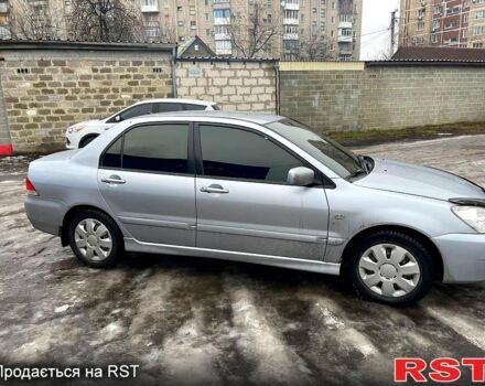 Сірий Міцубісі Lancer, об'ємом двигуна 1.6 л та пробігом 199 тис. км за 4399 $, фото 4 на Automoto.ua