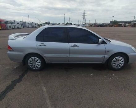 Сірий Міцубісі Lancer, об'ємом двигуна 1.6 л та пробігом 250 тис. км за 4000 $, фото 4 на Automoto.ua