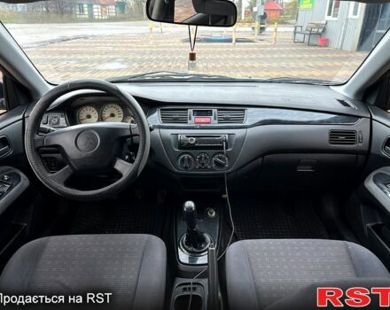 Сірий Міцубісі Lancer, об'ємом двигуна 1.6 л та пробігом 236 тис. км за 3800 $, фото 8 на Automoto.ua