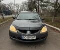 Сірий Міцубісі Lancer, об'ємом двигуна 1.6 л та пробігом 230 тис. км за 2799 $, фото 9 на Automoto.ua
