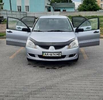 Серый Мицубиси Лансер, объемом двигателя 1.6 л и пробегом 277 тыс. км за 3500 $, фото 6 на Automoto.ua