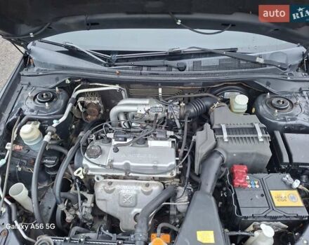 Серый Мицубиси Лансер, объемом двигателя 1.6 л и пробегом 305 тыс. км за 4000 $, фото 8 на Automoto.ua