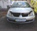 Сірий Міцубісі Lancer, об'ємом двигуна 1.58 л та пробігом 227 тис. км за 5400 $, фото 1 на Automoto.ua