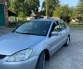 Сірий Міцубісі Lancer, об'ємом двигуна 1.6 л та пробігом 154 тис. км за 4700 $, фото 5 на Automoto.ua