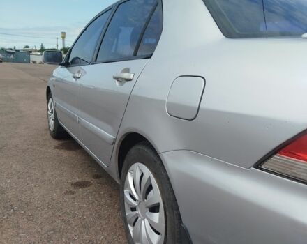 Серый Мицубиси Лансер, объемом двигателя 1.6 л и пробегом 250 тыс. км за 3600 $, фото 17 на Automoto.ua