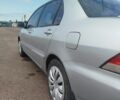 Серый Мицубиси Лансер, объемом двигателя 1.6 л и пробегом 250 тыс. км за 3600 $, фото 17 на Automoto.ua