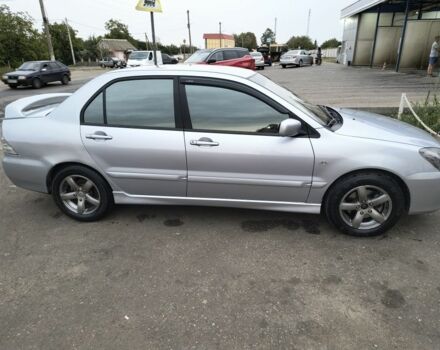 Серый Мицубиси Лансер, объемом двигателя 2 л и пробегом 212 тыс. км за 4300 $, фото 3 на Automoto.ua